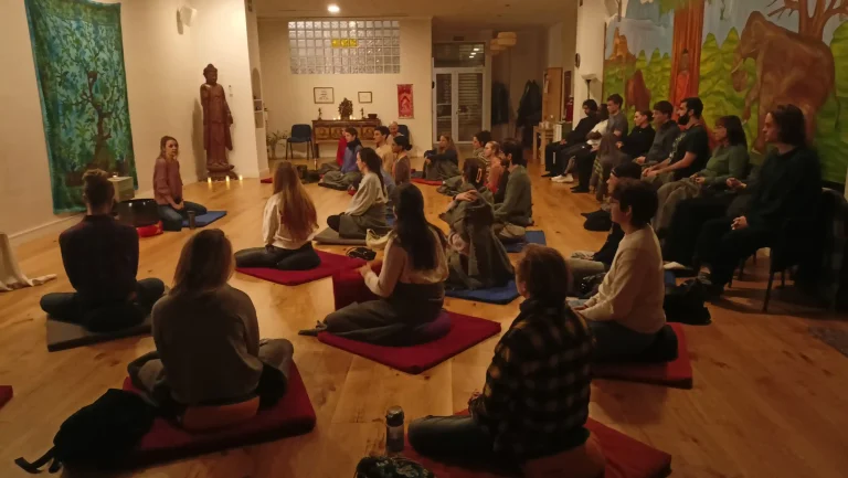 30 people practicing Vipassana meditation at Sala Dana